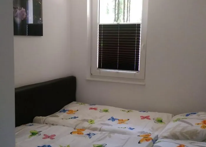 In Sued-waldhanglage Mit Seeblick By Interhome